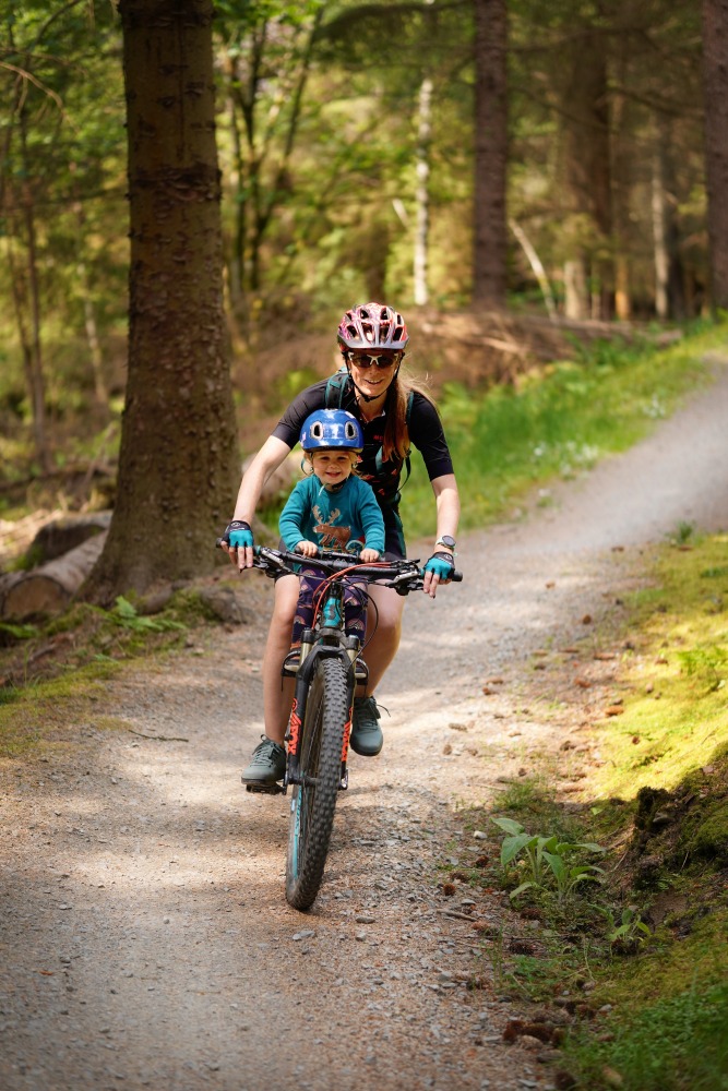 Kids Ride Shotgun seat review, mum and daughter riding on an off road trail