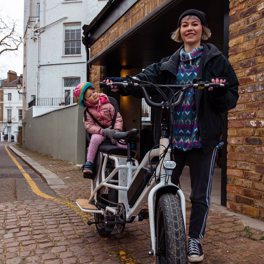 longtail Mycle cargo bike with mother and child