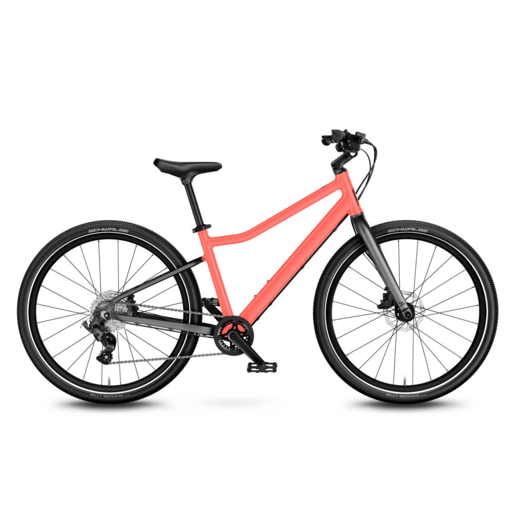 Best 24" kids' bikes: A side view of the woom Explore 5 kids' bike on a blank background