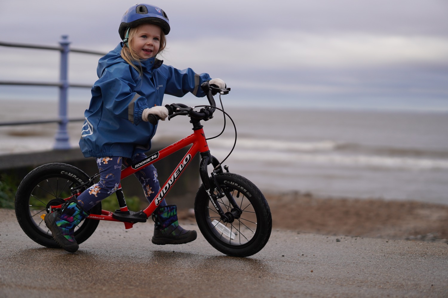 a little girl on a red, Kidvelo balance bike