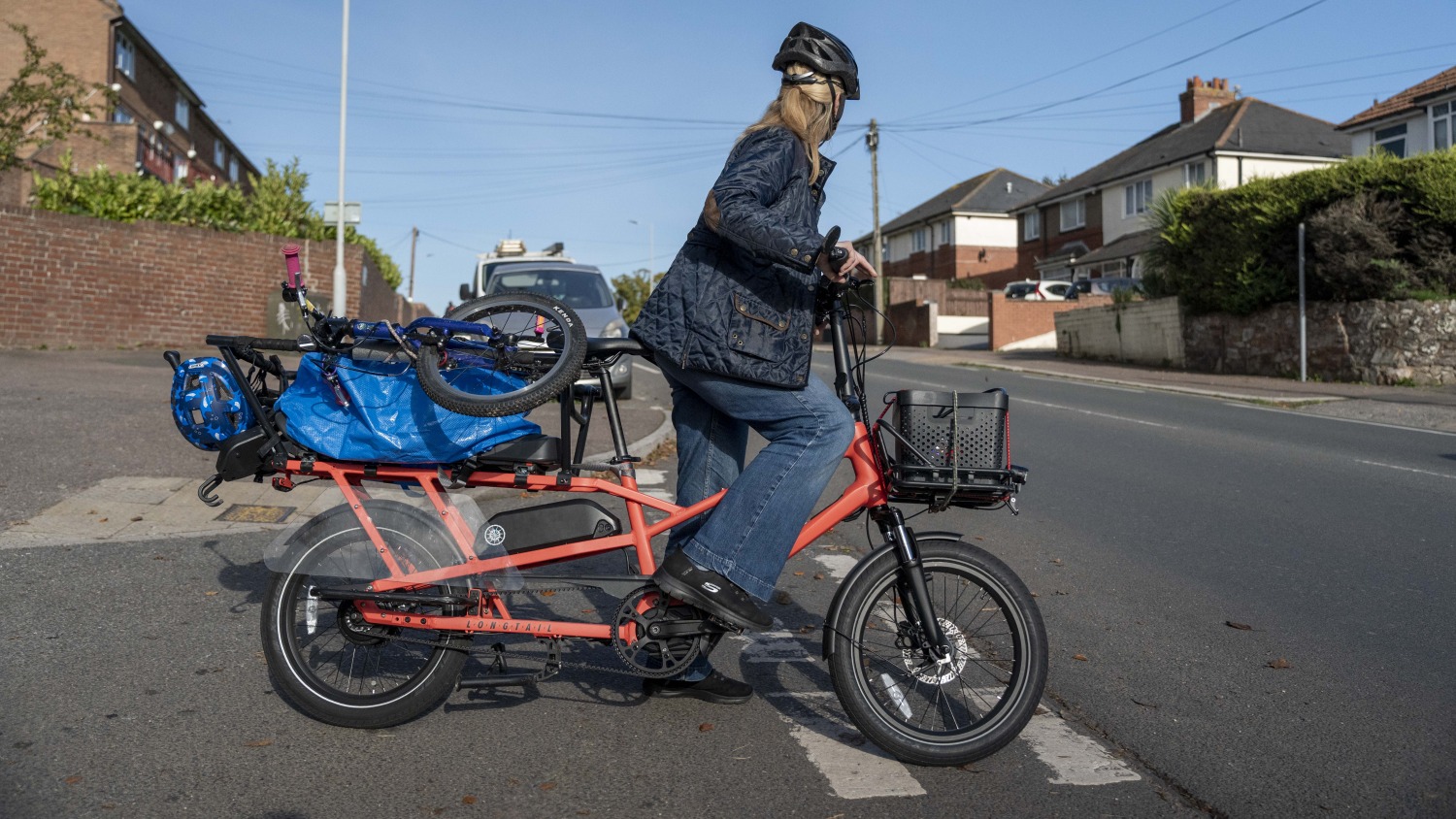 Julie with an Estarli ecargo with recycling on the back